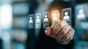 selecting the best candidate from a digital interface on clear panel with finger