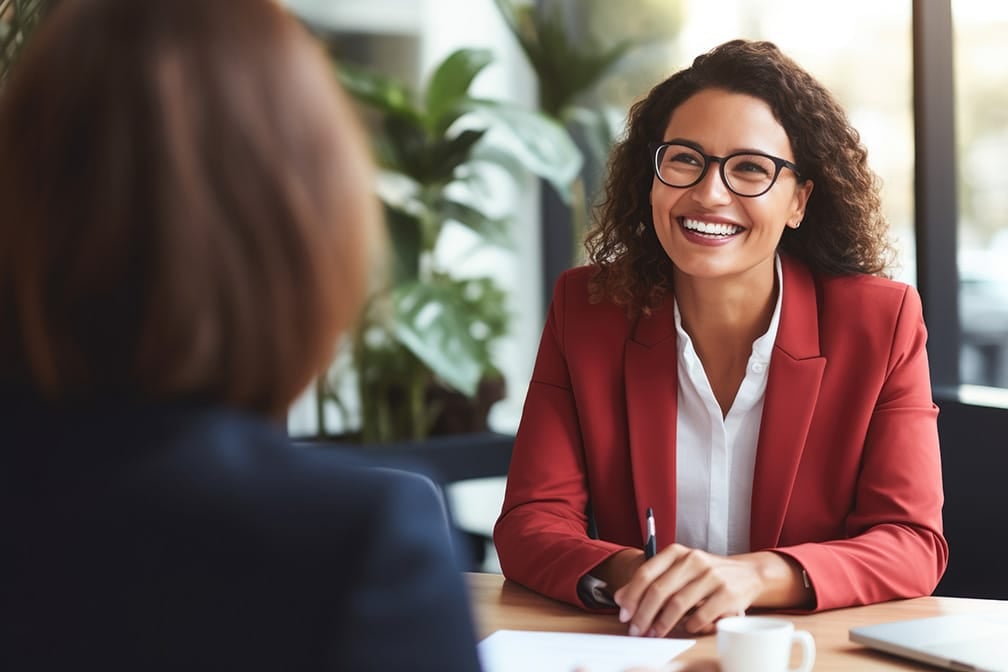 Middle aged professional business woman executive HR manager having job interview in corporate office meeting skills based hiring